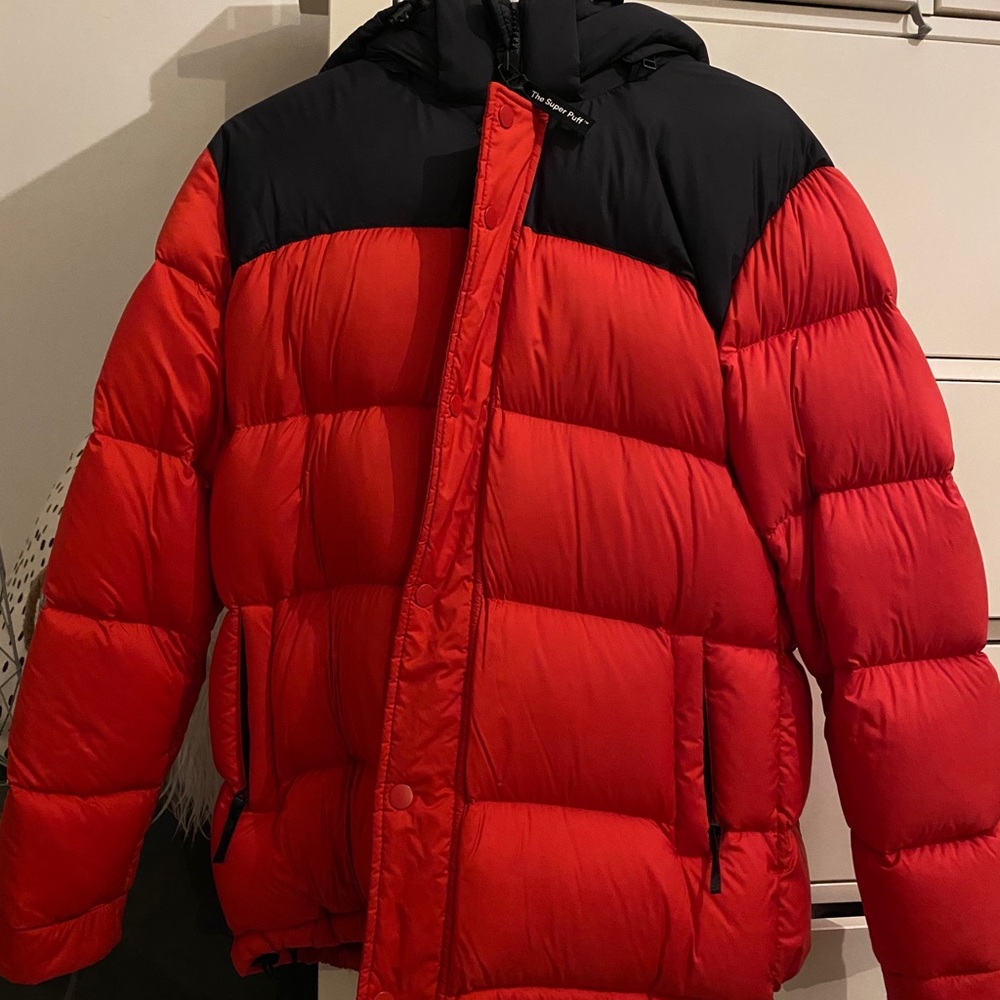 Red and black Aritzia superpuff